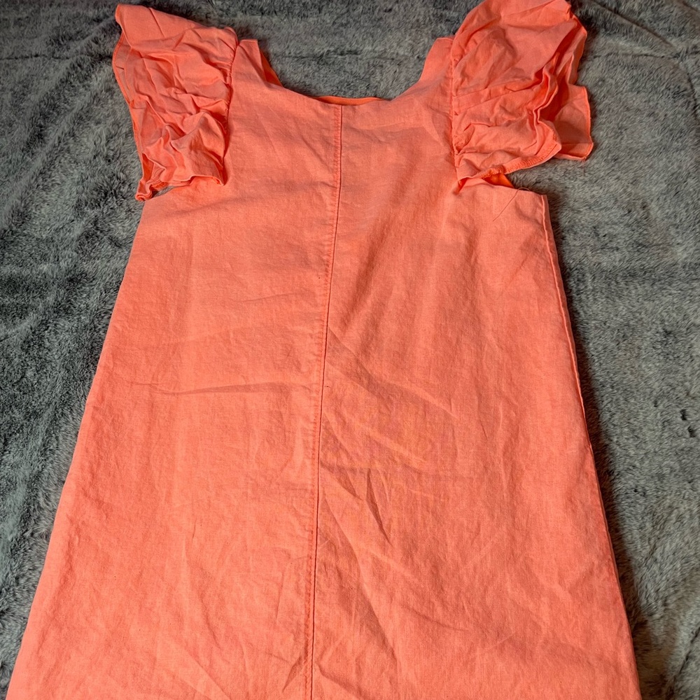 Pink dress with ruffle sleeves